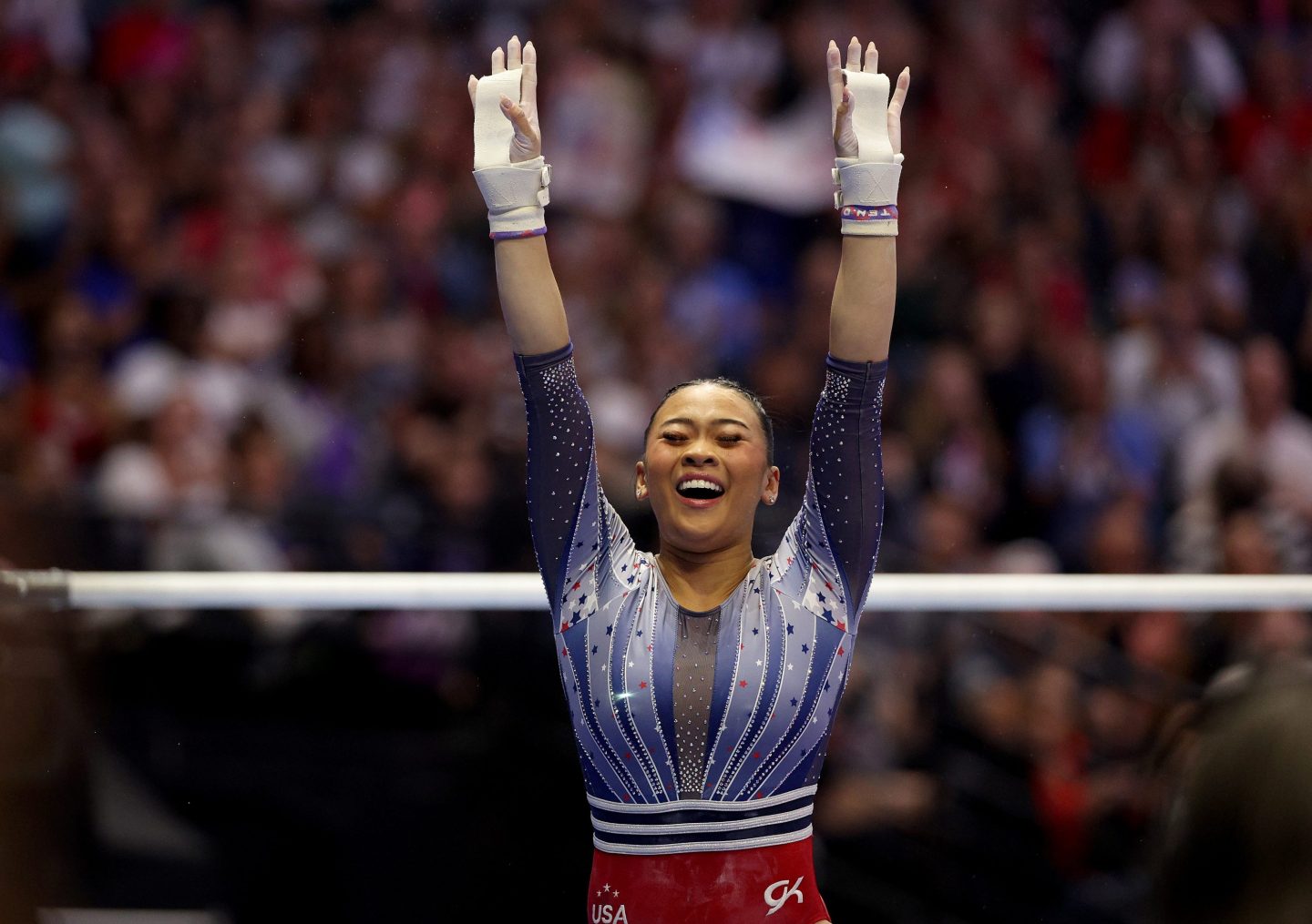 MINNEAPOLIS, MINNESOTA - JUNE 30:  Suni Lee reacts after her uneven bars routine on Day Four of the 2024 U.S. Olympic Team Gymnastics Trials at Target Center on June 30, 2024 in Minneapolis, Minnesota. (Photo by Elsa/Getty Images)